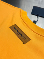 Louis Vuitton yellow T-shirt close-up of front neck label and crew collar
