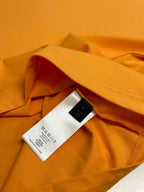Louis Vuitton yellow T-shirt hem and inner neckline label, folded fabric detail