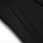 Black overcoat front pocket and straight welt detail