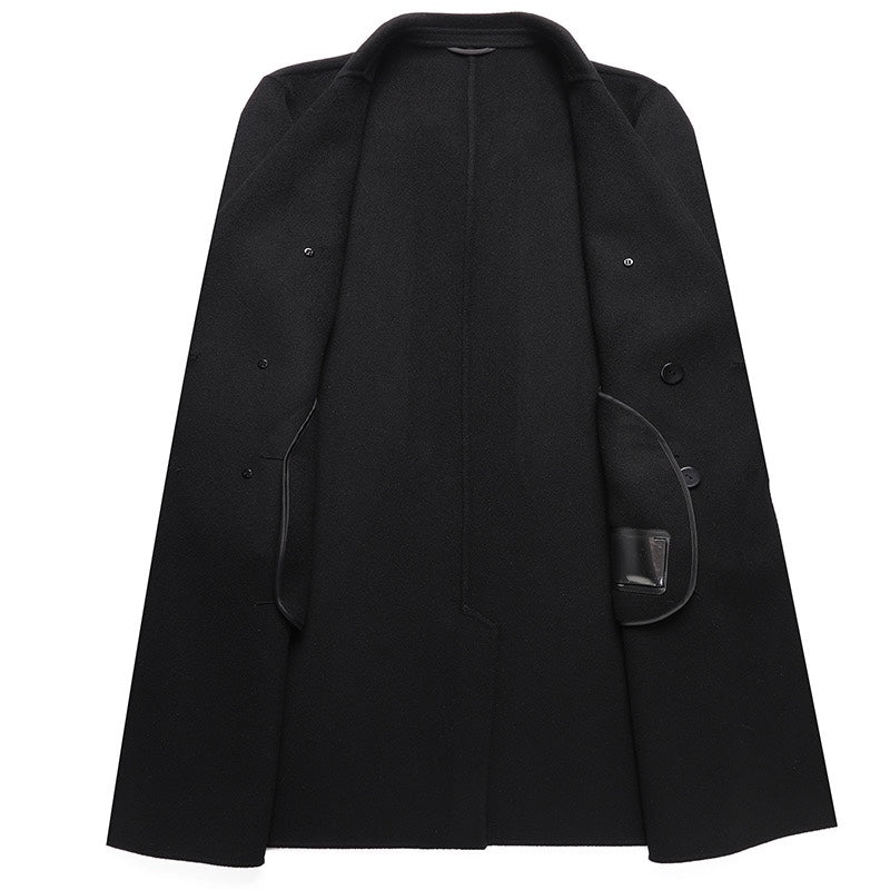Black long overcoat with double-breasted front and flap pockets