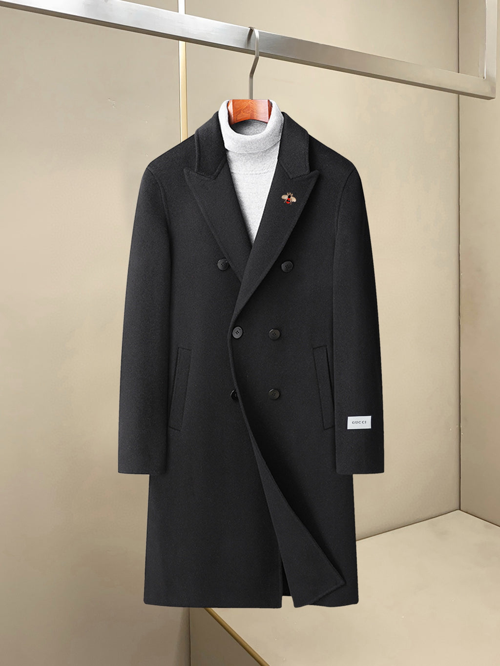 Black long double-breasted overcoat with notch lapels and front buttons