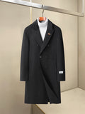Black long double-breasted overcoat with notch lapels and front buttons