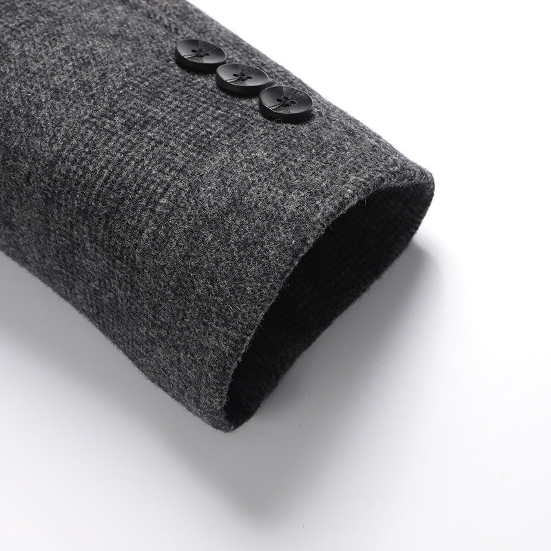 Charcoal long coat cuff with two black buttons and textured weave