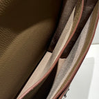 Hermes leather interior with partition pockets and tan lining