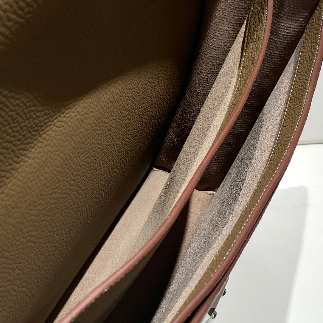 Hermes leather interior with partition pockets and tan lining
