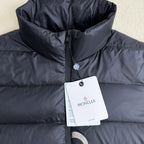 Moncler long puffer jacket in dark navy with hood, front zip, hang tag on chest