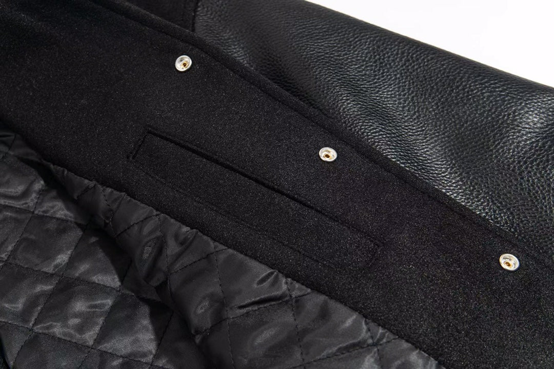 Givenchy dark jacket with snap placket and pocket detail