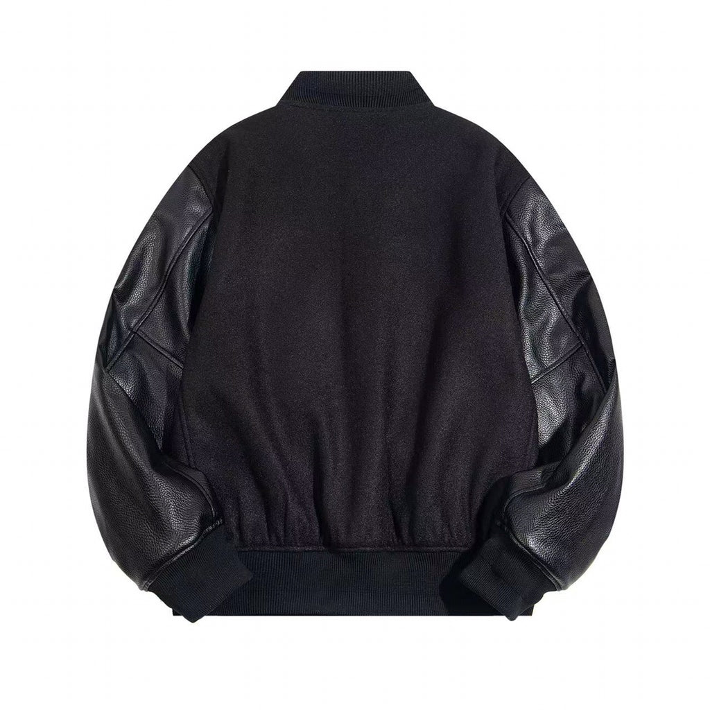 Black varsity jacket with ribbed collar and cuffs, leather-look sleeves
