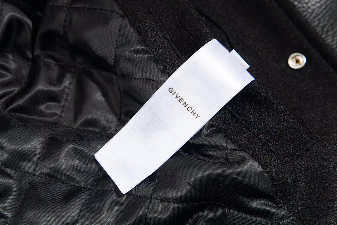 Black fabric lining with white brand tag labeled Givenchy