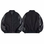 Black varsity jacket front and back view with snap buttons and ribbed trim