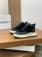Navy lace-up sneakers on display shelf with padded collar and white outsole