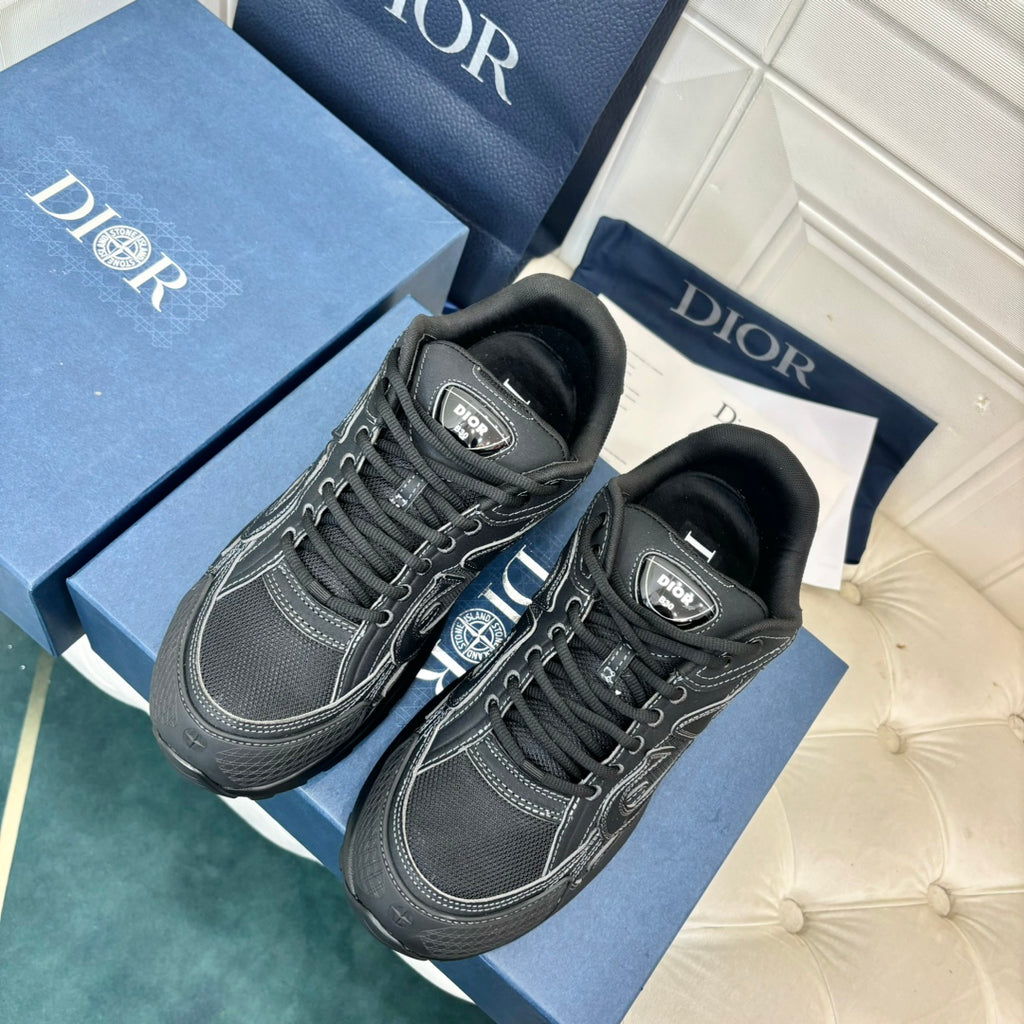 Dior unisex sneakers, dark grey with black laces and side logo, two shoes front view