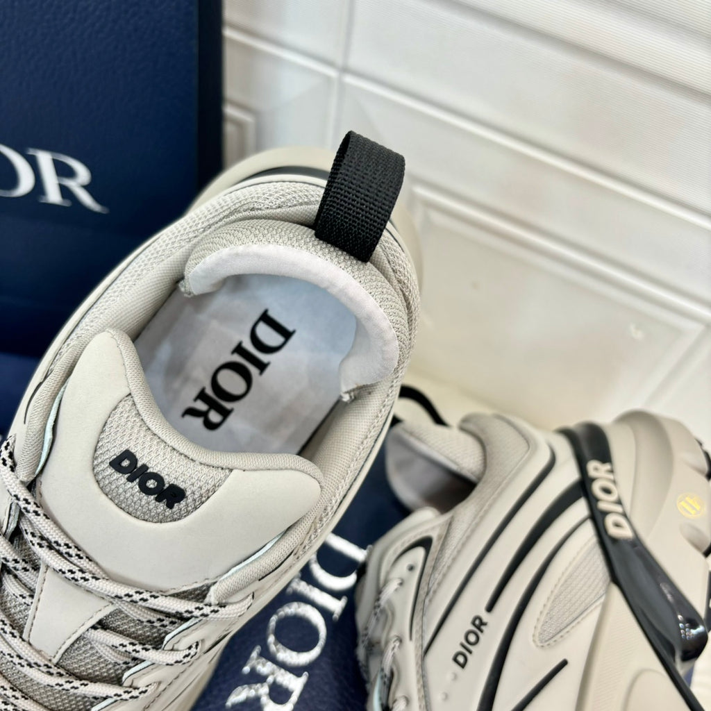 Dior unisex sneakers, light gray mesh close-up with lace-up and logo on tongue
