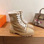 Hermes unisex high-top boots in tan with shearling lining, white lace-up design.