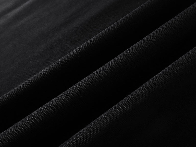 Black Gucci short-sleeve T-shirt fabric close-up with fine texture