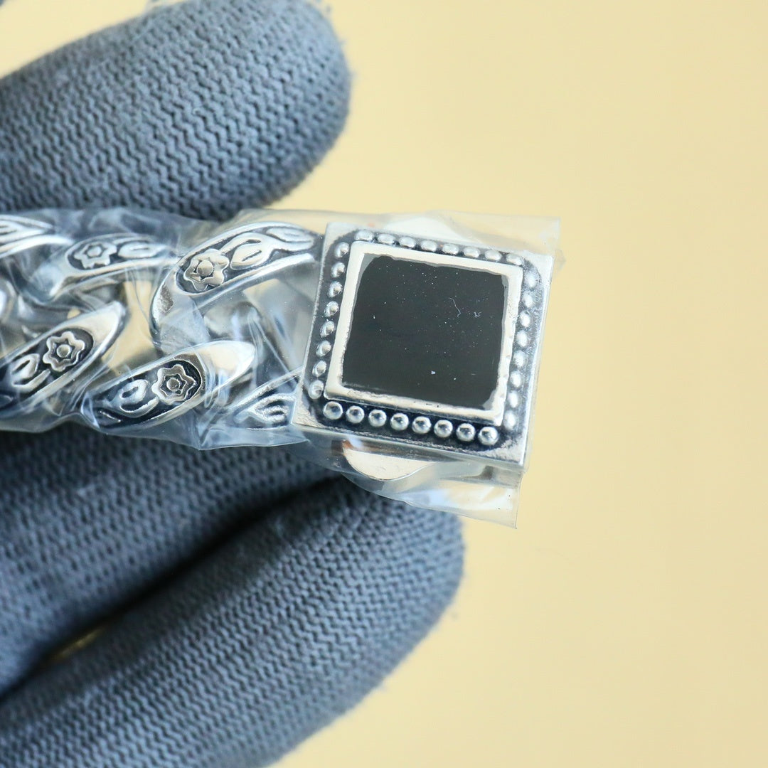 Rolex watch clasp/connector with engraved metal panel and square dark insert