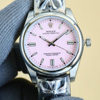Rolex Oyster Perpetual watch with pale pink dial, silver bracelet, baton hour markers