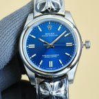 Rolex wristwatch with blue dial, gold-tone markers, silver case and bracelet