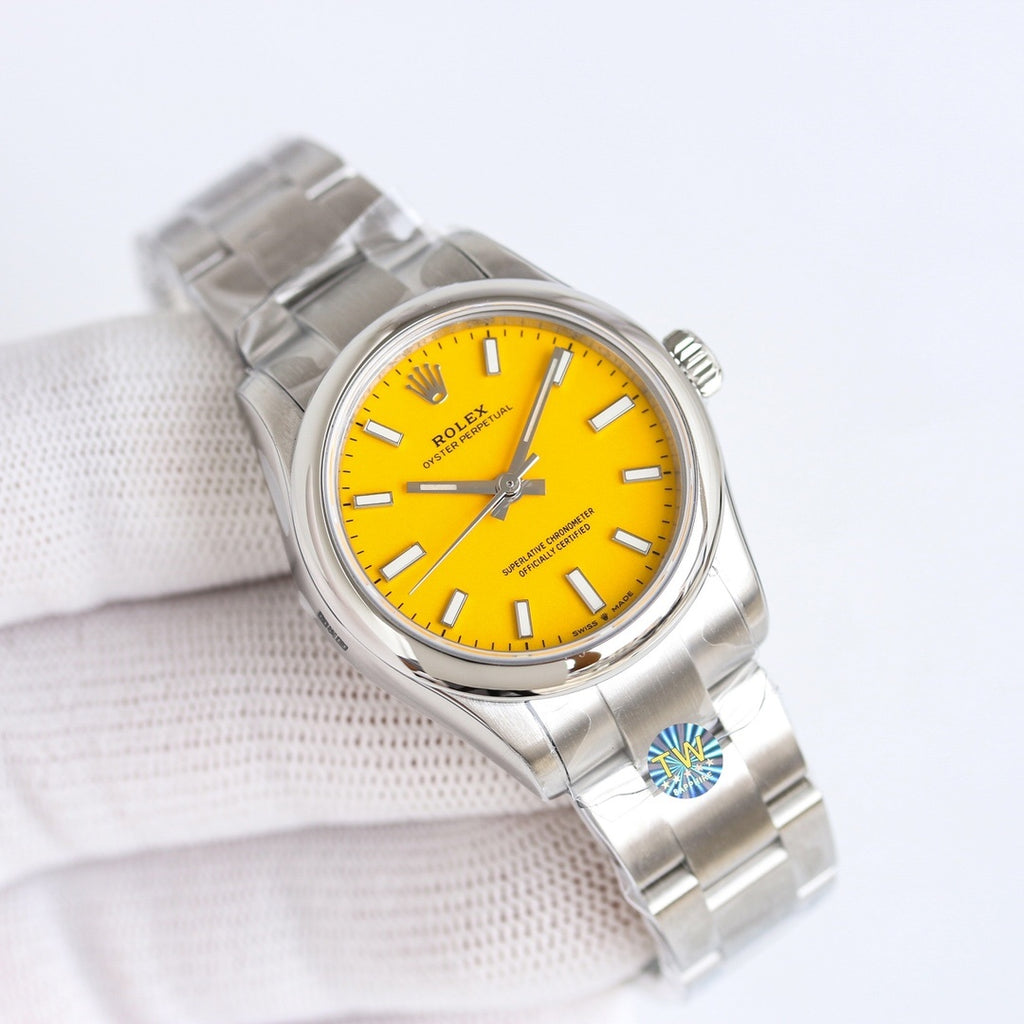 Steel wristwatch with bright yellow dial and silver link bracelet