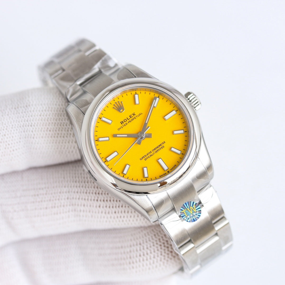 Steel wristwatch with bright yellow dial and silver link bracelet