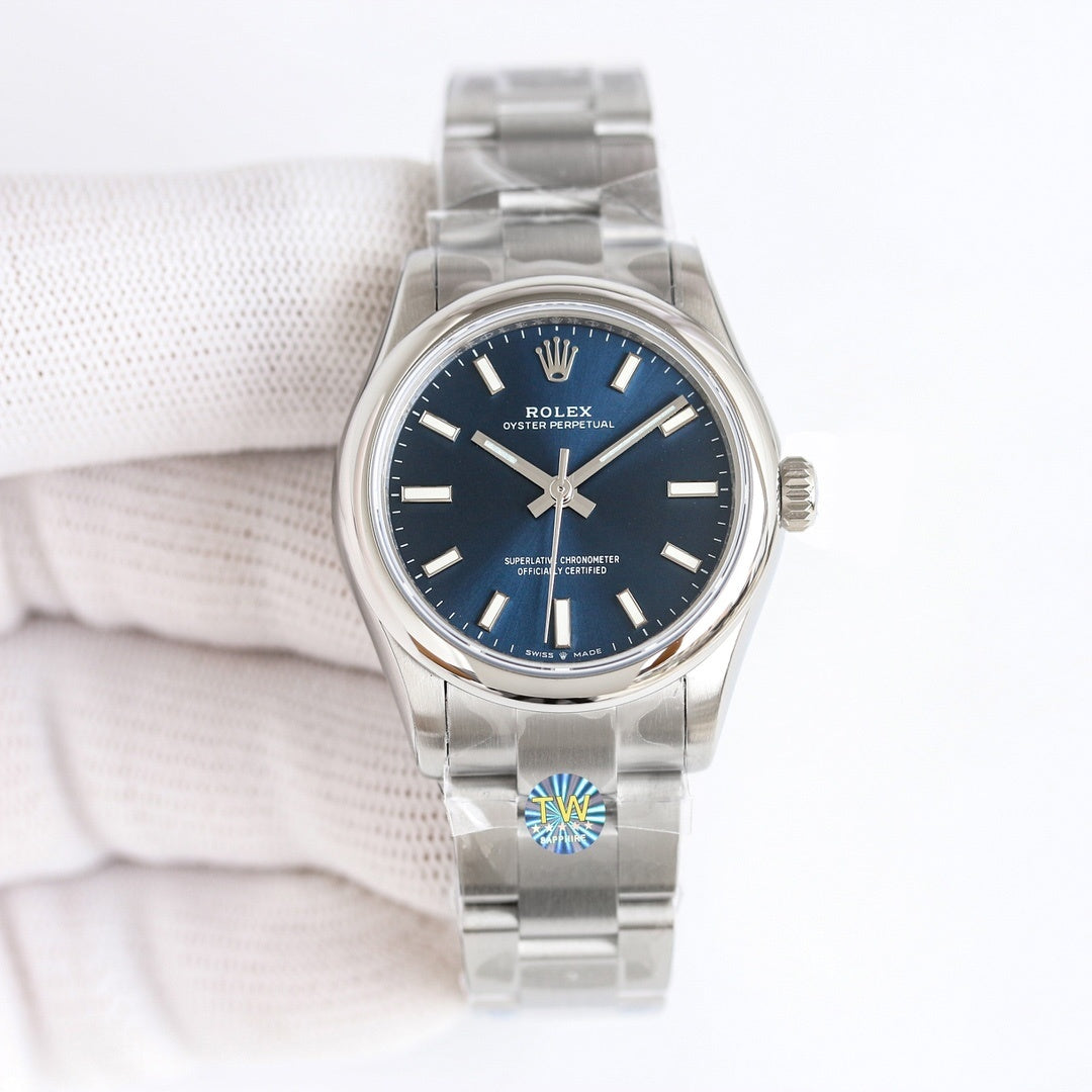 Steel wristwatch with dark blue dial and silver link bracelet, crown at side