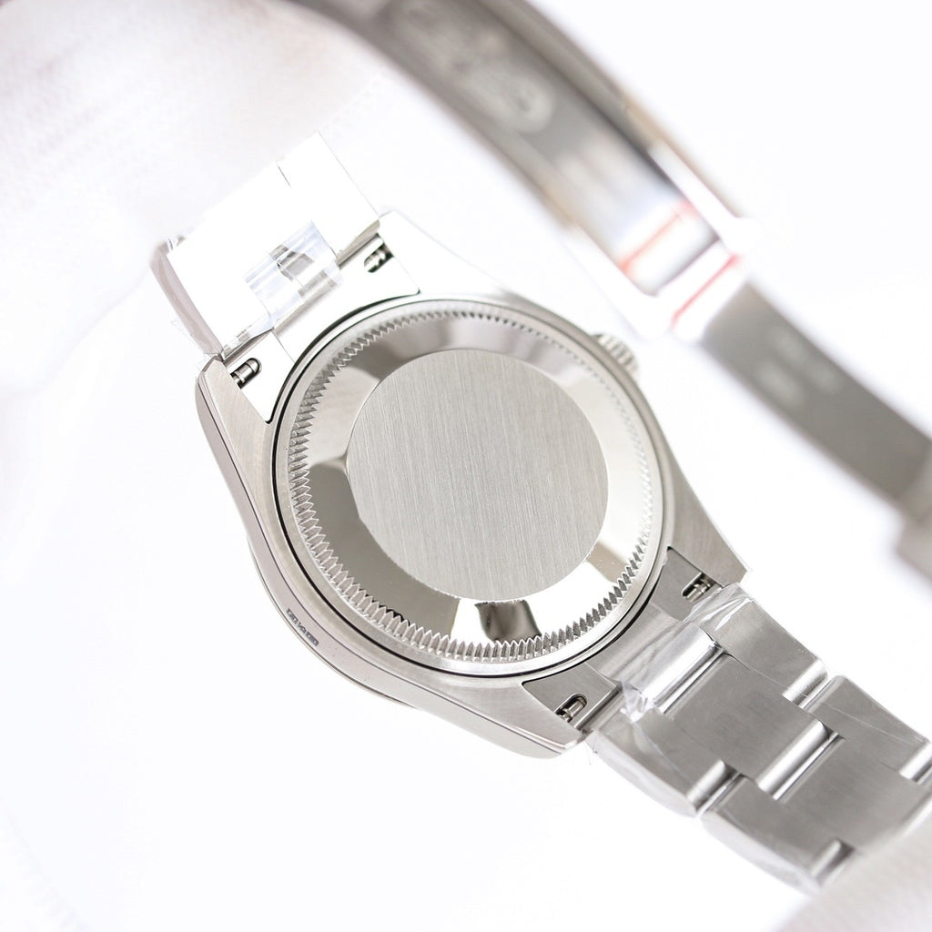 Stainless-steel wristwatch case back, smooth circular back with ridged edge and bracelet links