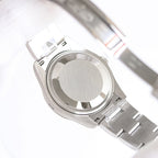 Stainless-steel wristwatch case back, smooth circular back with ridged edge and bracelet links