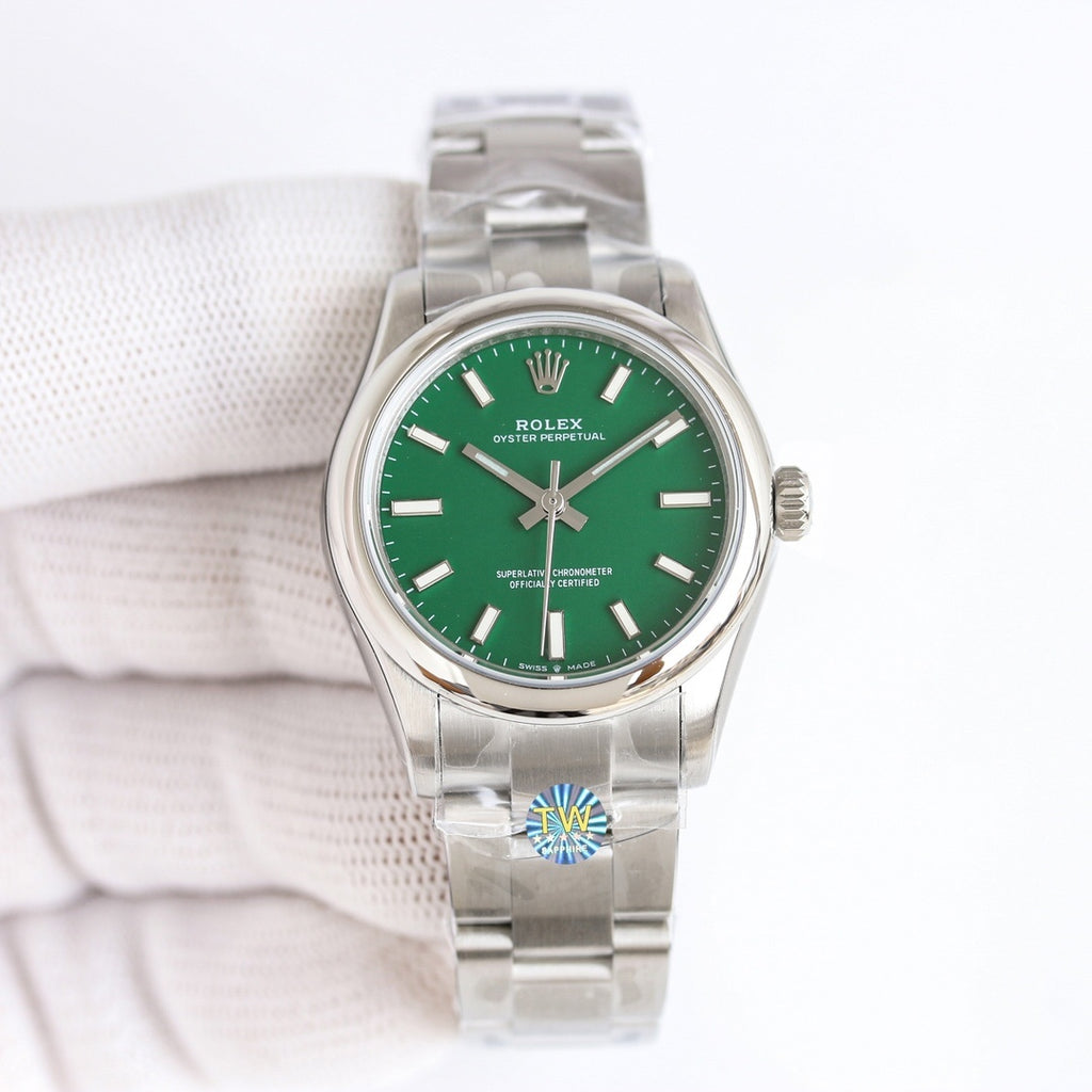 Rolex wristwatch with green dial and stainless-steel bracelet, round bezel, baton markers