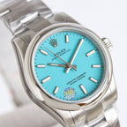 Rolex Oyster Perpetual watch close-up, turquoise dial, stainless steel case