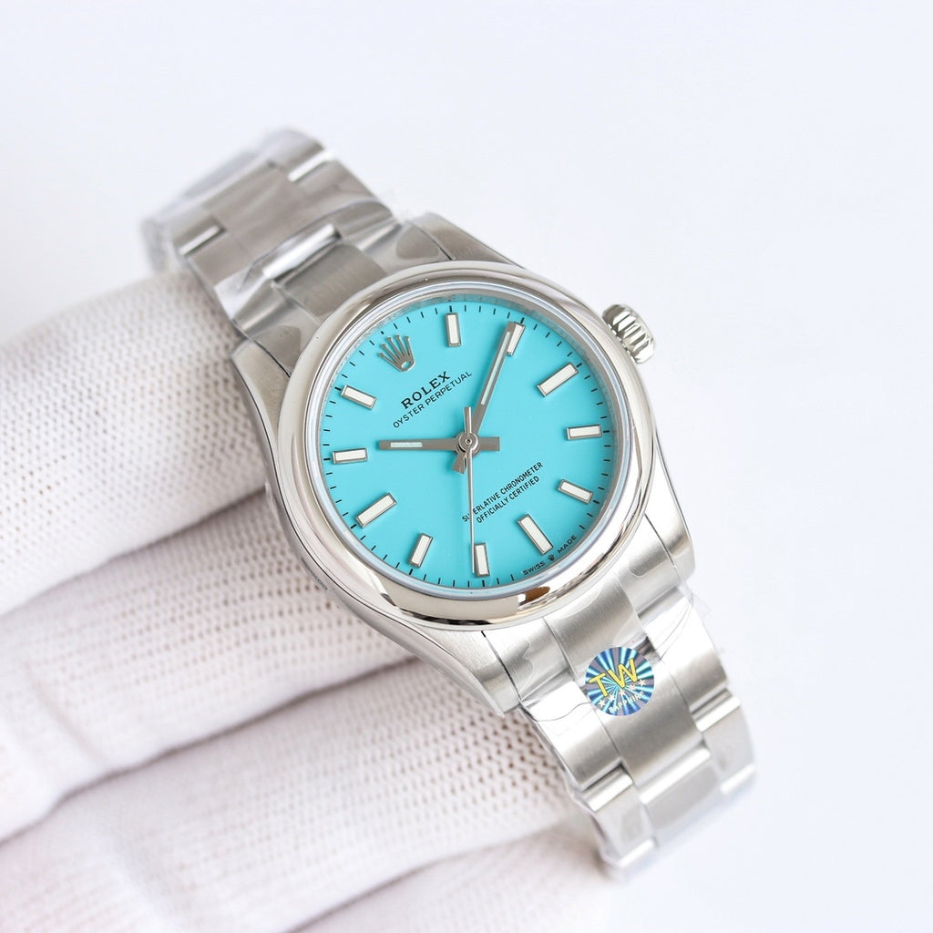 Rolex Oyster Perpetual watch angled view, turquoise dial on stainless steel bracelet