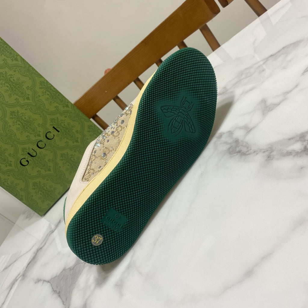 Gucci sneaker outsole in dark green with embossed logo and tread pattern