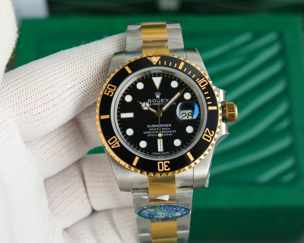 Rolex watch with black dial and gold bezel on two-tone metal bracelet