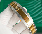 Rolex watch bracelet clasp, steel links with gold trim and gold crown logo
