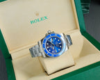 Rolex wristwatch with blue dial, stainless bracelet and bezel in open box