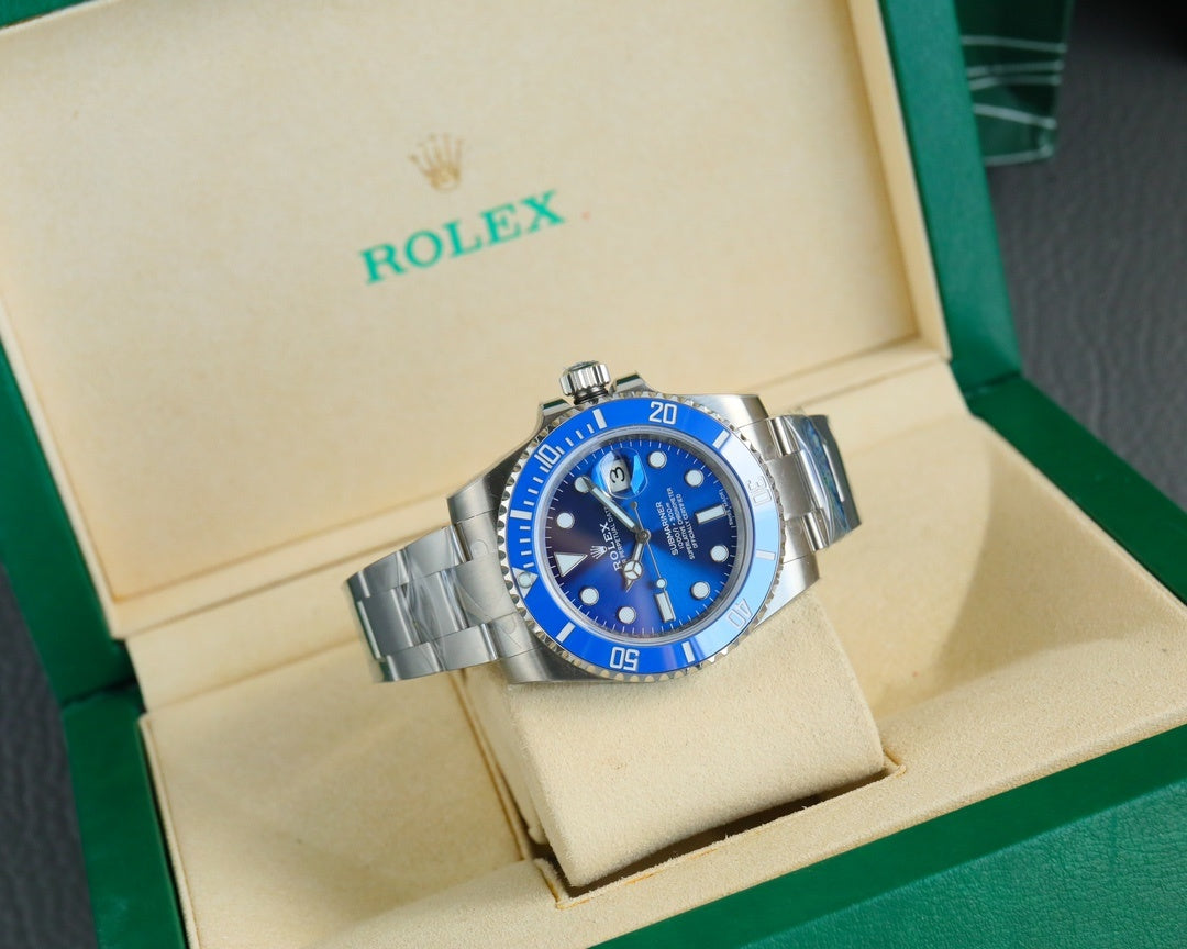 Rolex wristwatch with blue dial, stainless bracelet and bezel in open box