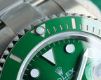 Rolex Submariner green dial close-up with index markers and triangular hour hand