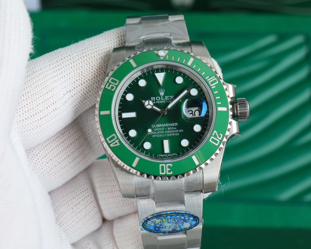 Rolex Submariner green dial stainless steel wristwatch with bracelet, bezel and crown