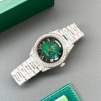 Rolex watch with green dial and stainless steel bracelet, angled view