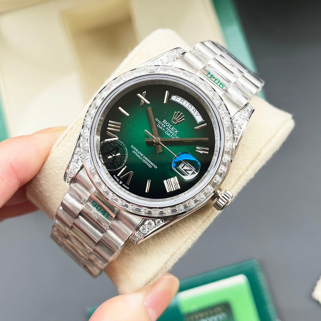 Rolex watch with green dial, silver bezel, and stainless steel bracelet