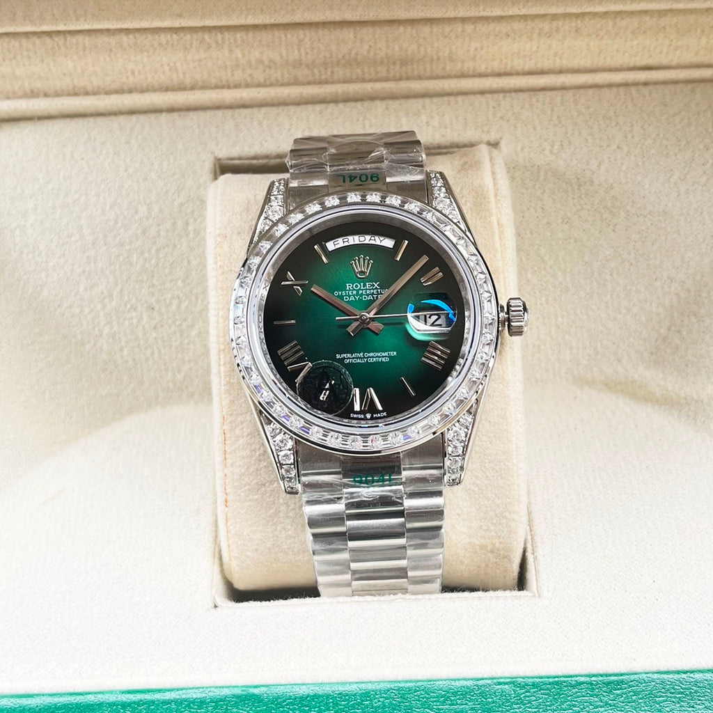 Rolex watch front view with green dial and stainless steel bracelet