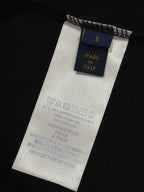 Inside neck label shows size S and 'Made in Italy' on black T-shirt