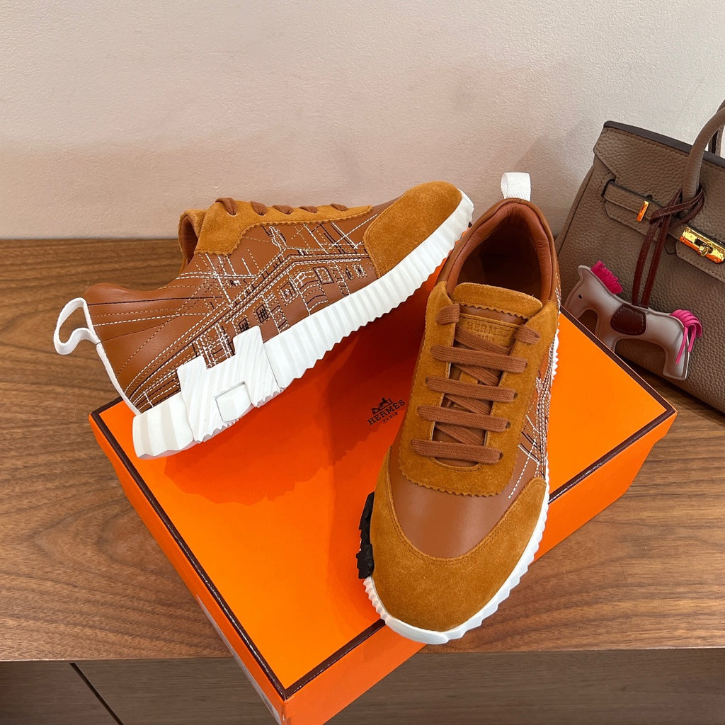 Hermes unisex sneakers tan suede with geometric side stripe and orange laces, white sole