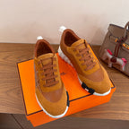 Hermes unisex sneakers tan suede with white soles, lace-up closure, stitched details
