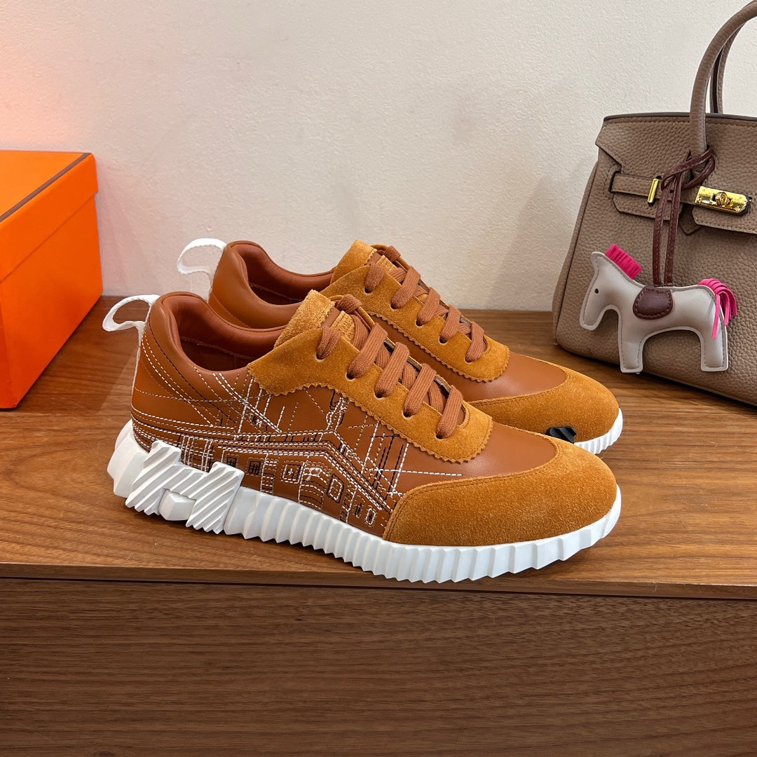 Hermes unisex sneakers tan suede with panel stitching, lace-up front and chunky white sole