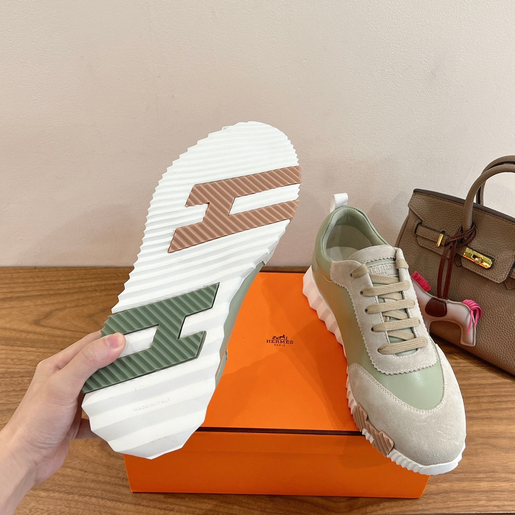 Unisex sneakers showing outsole: white tread with green stripe, lace-up upper