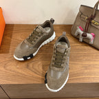 Hermes unisex lace-up sneakers in olive suede with cushioned collar and white sole