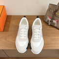 Hermes unisex sneakers, white with black heel tab and lace-up design