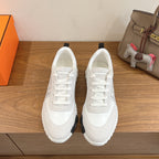 Hermes unisex sneakers, white with black heel tab and lace-up design