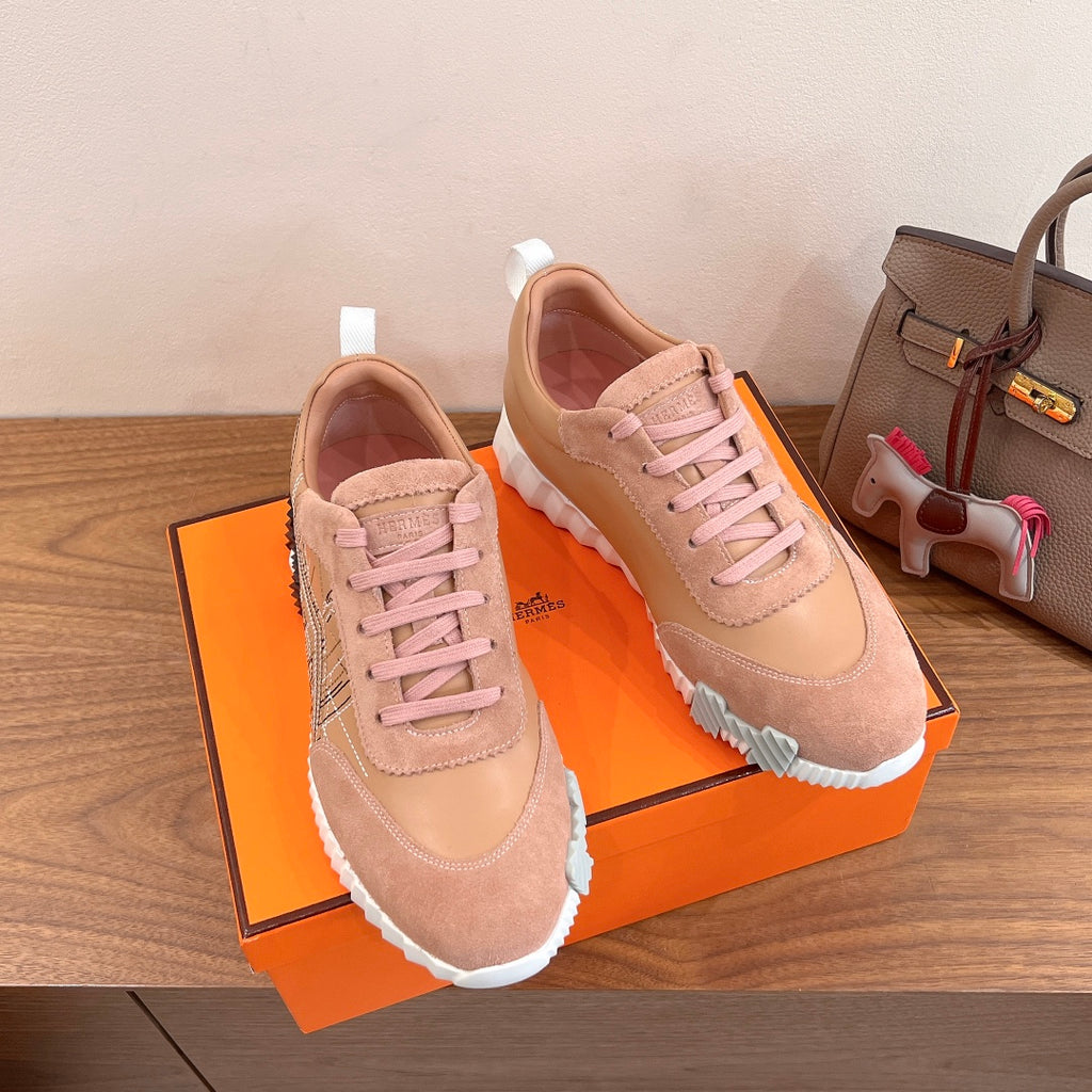 Hermes unisex sneakers in light pink, lace-up design with white midsole and outsole