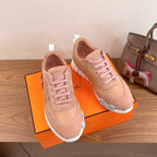 Hermes unisex sneakers in light pink, lace-up design with white midsole and outsole